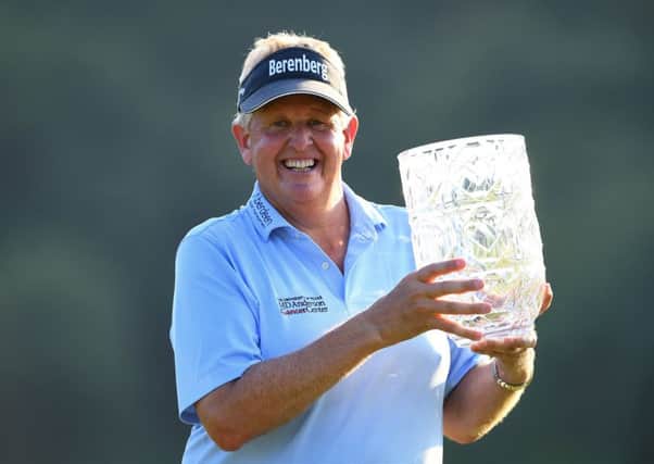 Colin Montgomerie poses with the trophy after winning the Japan Airlines Championship at Narita Golf Club. Picture: Getty Images