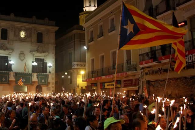 Demonstrators march during a Catalan pro-independence demonstration. (Photo by Sandra Montanez/Getty Images)