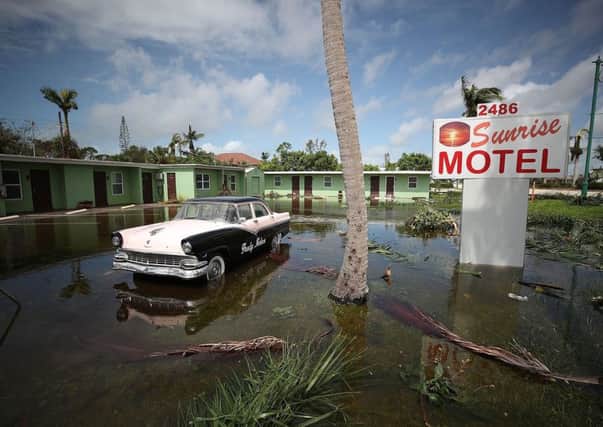 The Sunrise Motel sits under water in East Naples, Florida. Picture: Getty