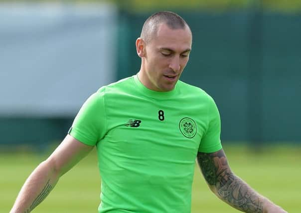 Scott Brown has committed his future to Celtic for two more years.