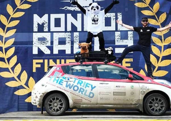 Chris Ramsey in Ulan-Ude in Siberia, after completing the 10,000-mile Mongol Rally with his wife Julie while raising money for the charity. Picture: PA