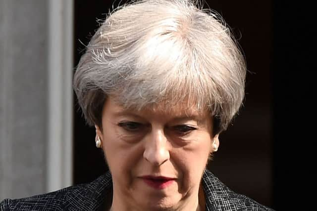 Prime Minister Theresa May leaves 10 Downing Street for Parliament. Picture: Getty Images