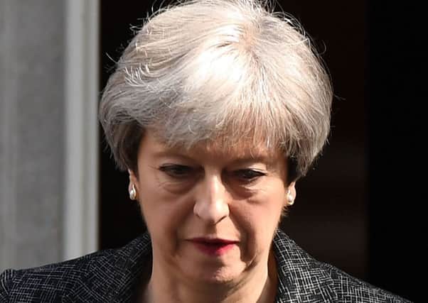 Prime Minister Theresa May leaves 10 Downing Street for Parliament. Picture: Getty Images