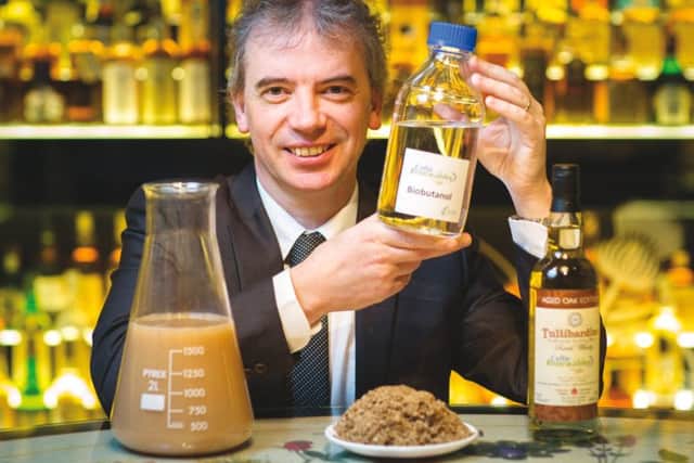 Prof Martin Tangney, founder of Celtic Renewables showing the first sample of bio-butanol at The Scotch Whisky Experience, Edinburgh.