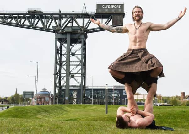 Finlay Wilson and Tristan Cameron-Harper in some yoga positions.
Picture: John Devlin