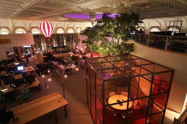 Itison's new Glasgow HQ features a hot air balloon, a large tree and a fireman's pole. Picture: Fraser Jarvis