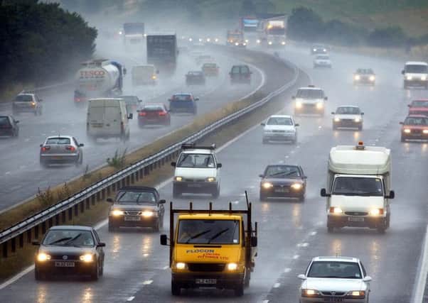 Warnings are in place that heavy rain may impact on rush hour traffic. Picture: PA