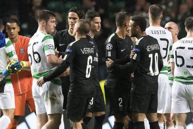 Celtic's Anthony Ralston (56) exchanges words with Neymar at full-time. Picture: SNS