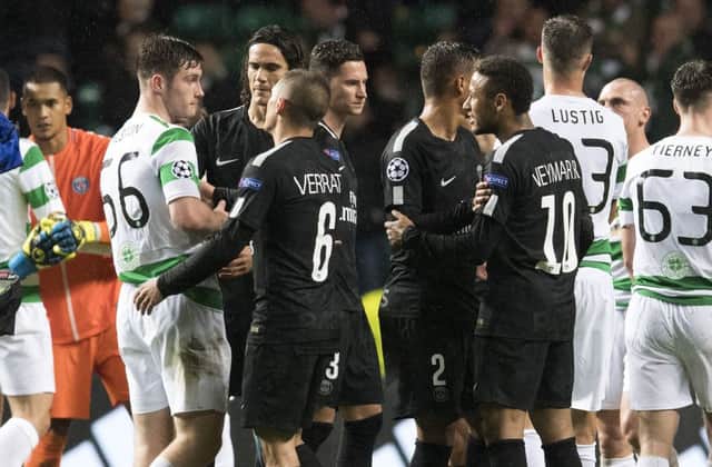 Celtic's Anthony Ralston (56) exchanges words with Neymar at full-time. Picture: SNS