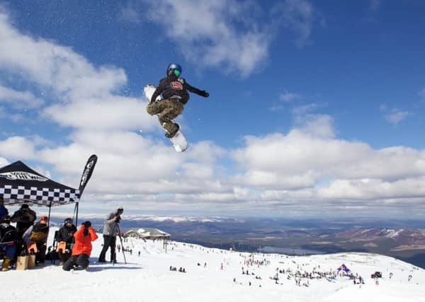 Snowboarders compete in a big air contest at CairnGorm Mountain PIC: Paul Campbell