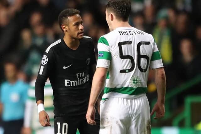 Paris Saint Germain's Neymar clashes with Celtic's Anthony Ralston. Picture: Andrew Milligan/PA Wire