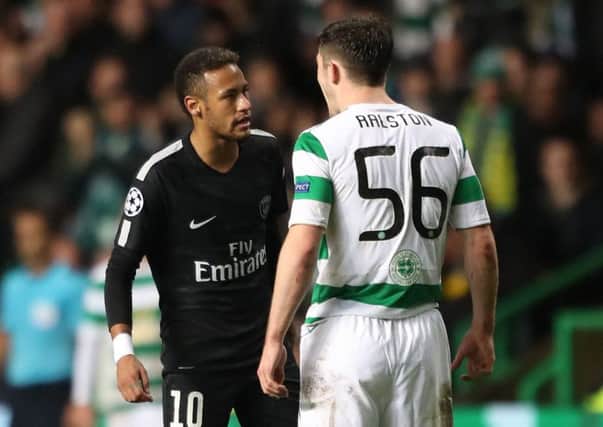 Paris Saint Germain's Neymar clashes with Celtic's Anthony Ralston. Picture: Andrew Milligan/PA Wire