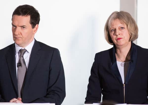 George Osborne and Theresa May. Picture: ANDREW COWIE/AFP/Getty Images