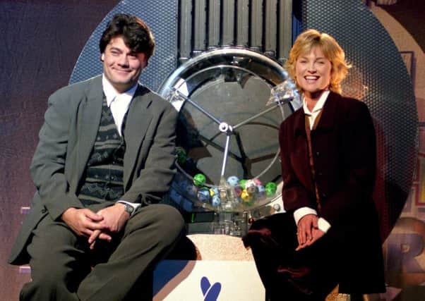 National Lottery presenters Gordon Kennedy and Anthea Turner ahead of the first ever draw taking place in 1994.