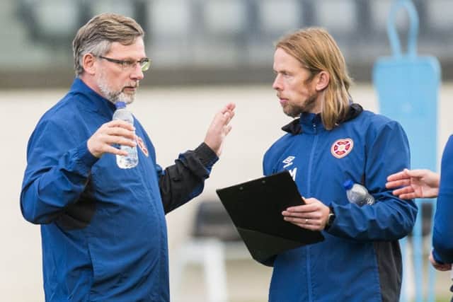 Hearts manager Craig Levein, left, discusses strategy with assistant Austin MacPhee. Picture: SNS.