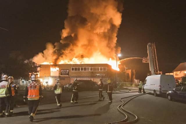 Firefighters tackling a blaze at a timber yard in Harrow, north-west London. Picture: PA