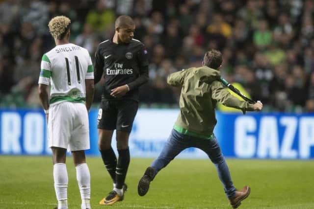 The Celtic fan aimed a kick at Kylian Mbappe of Paris Saint Germain. Picture: Getty
