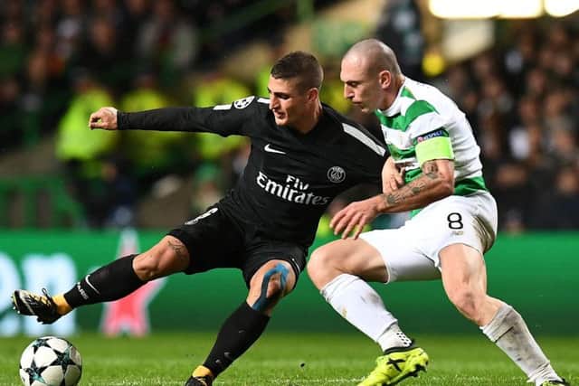 Paris Saint-Germain's Italian midfielder Marco Verratti (left) vies with Celtic captain Scott Brown. Picture: AFP