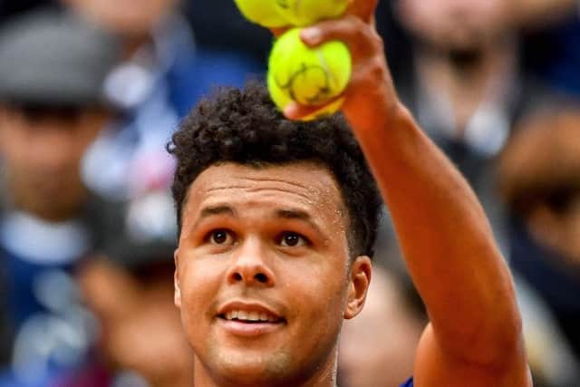 France's Jo-Wilfried Tsonga celebrates after winning against  Serbia's Laslo Djere in their singles rubber in the Davis Cup semi-final in Lille. Picture: Philippe Huguen/AFP/Getty Images