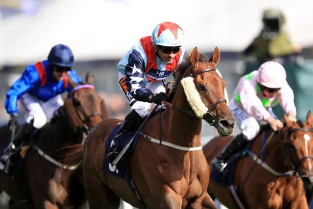 Desert Skyline, ridden by Silvestre de Sousa, centre, wins The Doncaster Cup on day three of the William Hill St Leger Festival. Picture: Mike Egerton/PA Wire