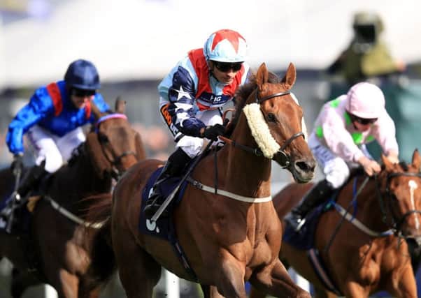 Desert Skyline, ridden by Silvestre de Sousa, centre, wins The Doncaster Cup on day three of the William Hill St Leger Festival. Picture: Mike Egerton/PA Wire