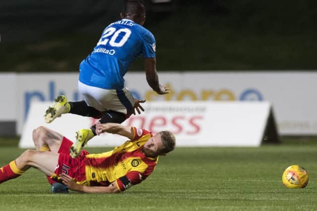 Chris Erskine is sent off for a lunge on Rangers' striker Alfredo Morelos. Picture: SNS
