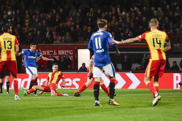 Rangers Graham Dorrans scores his sides second goal, which rescued a point for the visitors. Picture: SNS