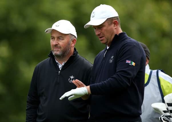 Damien McGrane and partner Greig Hutcheon look on during the morning fouball matches on day 1 of the PGA Cup at Foxhills. Picture: Jan Kruger/Getty Images