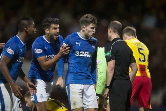 Josh Windass (centre) and team-mates appeal to the referee for a late penalty. Picture: PA