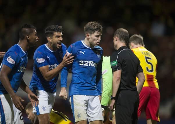 Josh Windass (centre) and team-mates appeal to the referee for a late penalty. Picture: PA