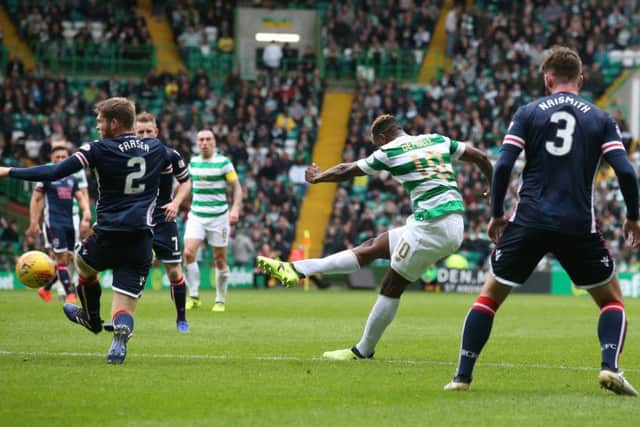 Celtic's Moussa Dembele scores his side's second goal of the game. Picture: Andrew Milligan/PA Wire