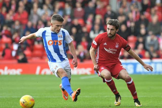 Aberdeen's Graeme Shinnie battles with Adam Frizzell. Picture: SNS/Craig Foy