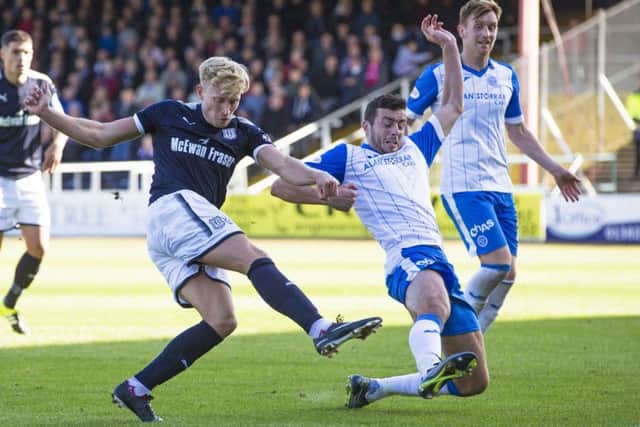 Dundee's A-Jay Leitch-Smith scores his second goal to make it 2-0. Picture: SNS/Kenny Smith