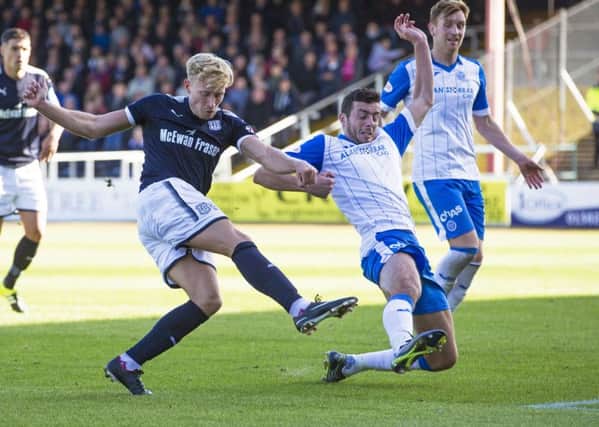 Dundee's A-Jay Leitch-Smith scores his second goal to make it 2-0. Picture: SNS/Kenny Smith