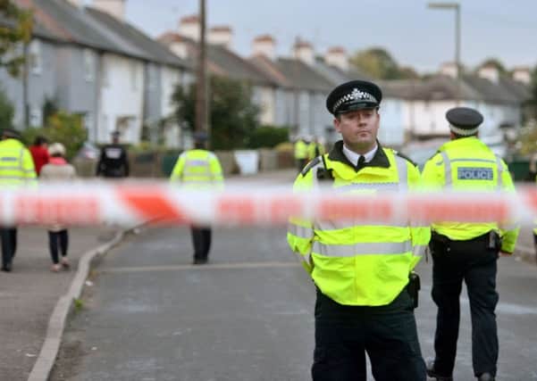 Police officers taking part in an operation in Cavendish Road, Sunbury-on-Thames, Surrey, as part of the investigation into the Parsons Green bombing. Picture; PA