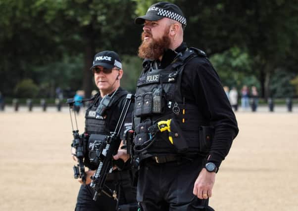 Armed police officers on patrol in the wake of the failed terrorist attack. Picture: Getty Images