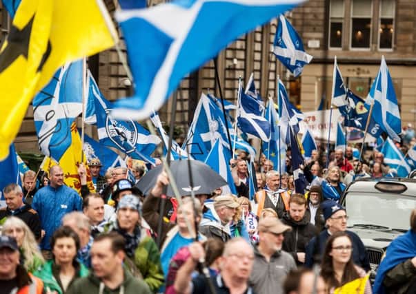 Hundreds filled the streets of Glasgow for a pro-independance march on Saturday. Picture: John Devlin