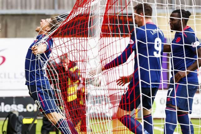 Ross Callachan, left, celebrates his goal