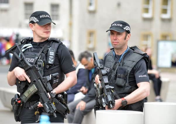 Armed police to be reduced after terror level downgraded following London attack. Picture: Jon Savage