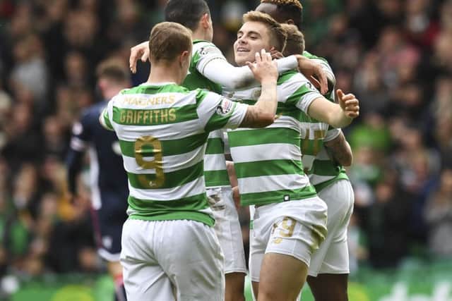 James Forrest (right) celebrates his goal with his team-mates. Picture: SNS.