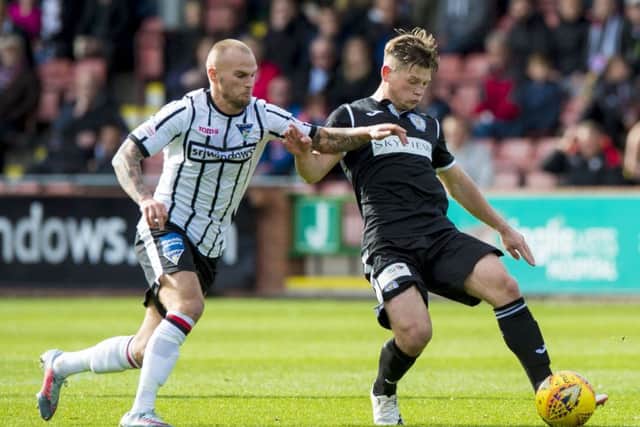 Dunfermline's Kallum Higginbotham, left. Picture: Sammy Turner/SNS