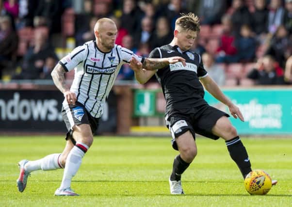 Dunfermline's Kallum Higginbotham, left. Picture: Sammy Turner/SNS