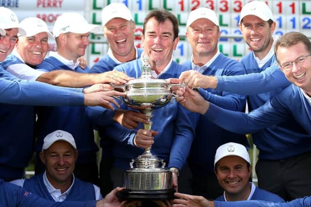 The victorious GB & Ireland team pose with the trophy after the final day of the 28th PGA Cup at Foxhills Golf Course. Picture: Jan Kruger/Getty Images