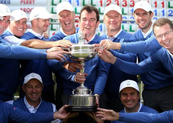 The victorious GB & Ireland team pose with the trophy after the final day of the 28th PGA Cup at Foxhills Golf Course.  Picture: Jan Kruger/Getty Images