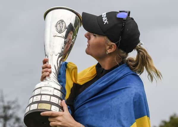 Swedens Anna Nordqvist kisses the trophy after her victory. Picture: Philippe Desmazes/AFP/Getty Images