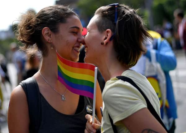 Two women during the Gay Pride parade in Belgrade where Serbia's lesbian prime minister joined hundreds of activists. Picture: ANDREJ ISAKOVIC/AFP/Getty Images