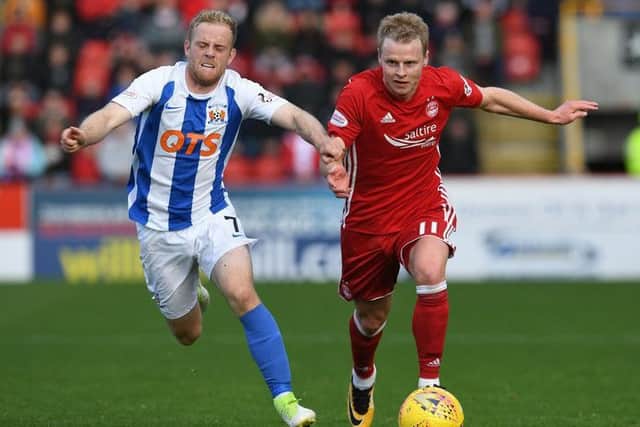 Kilmarnocks Rory McKenzie tries to keep pace with Aberdeen winger Gary Mackay-Steven. Picture: SNS.