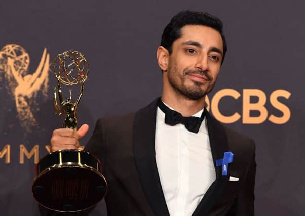 Riz Ahmed poses with the Emmy for Outstanding Lead Actor in a Limited Series or Movie for "The Night Of". Picture: AFP/Getty Images
