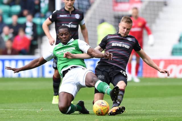 Marvin Bartley challenges Motherwell's Andy Rose. The midfield enforcer faces a late fitness test ahead of Tuesday's match. Picture: SNS Group