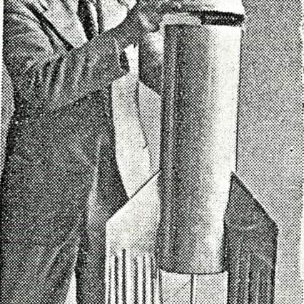 Inventor Gerhard Zucker with one of his rockets. PIC: Contributed.